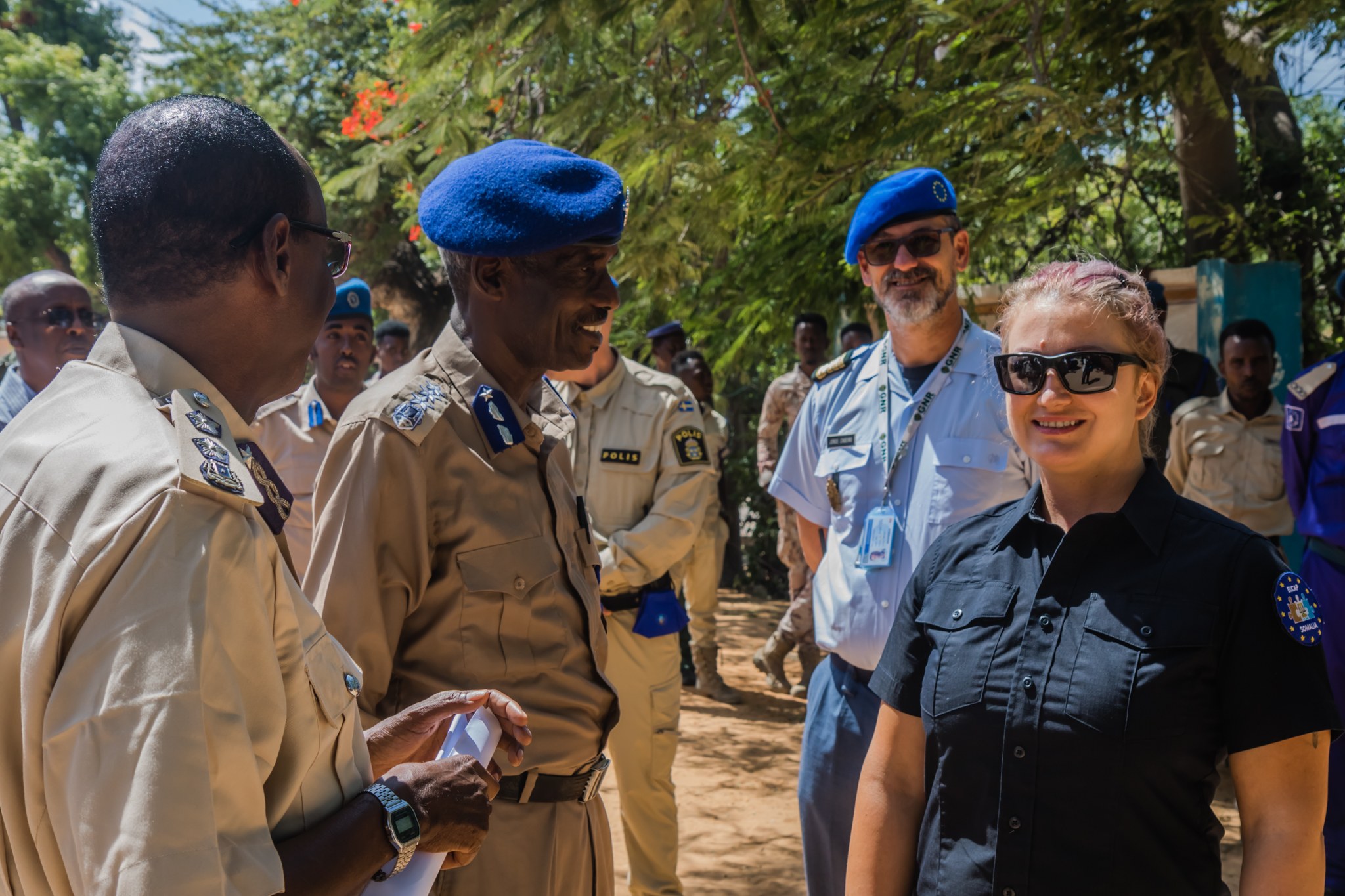 Police advisors with their Somali Police Force counterparts on the occasion of a parade.